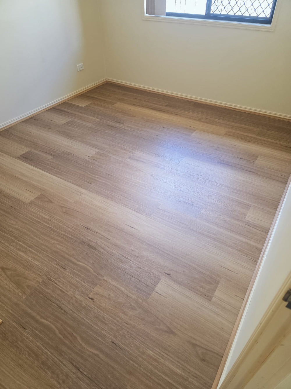 Hybrid flooring installation in a real Brisbane home